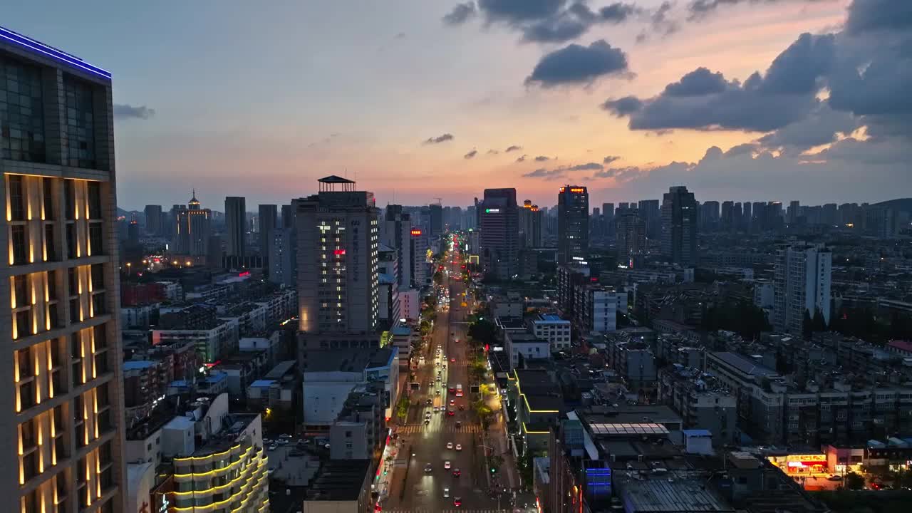 航拍徐州市主城区夕阳晚霞苏宁广城市宣传全景视频素材