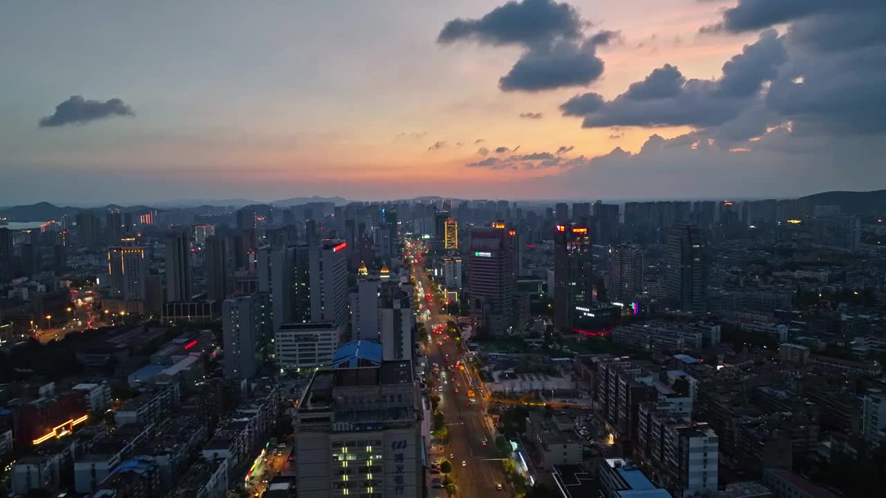 航拍徐州市主城区夕阳晚霞苏宁广城市宣传全景视频素材