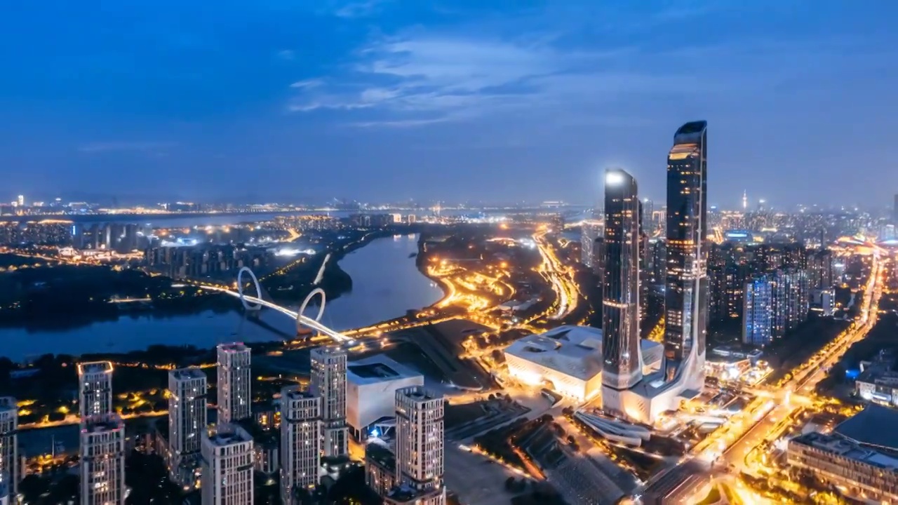 中国江苏南京河西区青奥中心保利大剧院天际线夜景航拍延时摄影视频素材