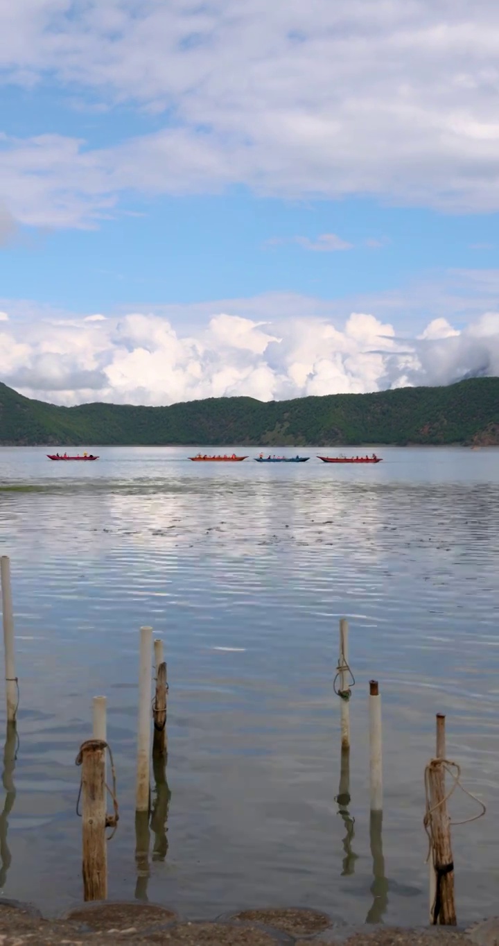 旅游景区：丽江泸沽湖风光与游船视频素材