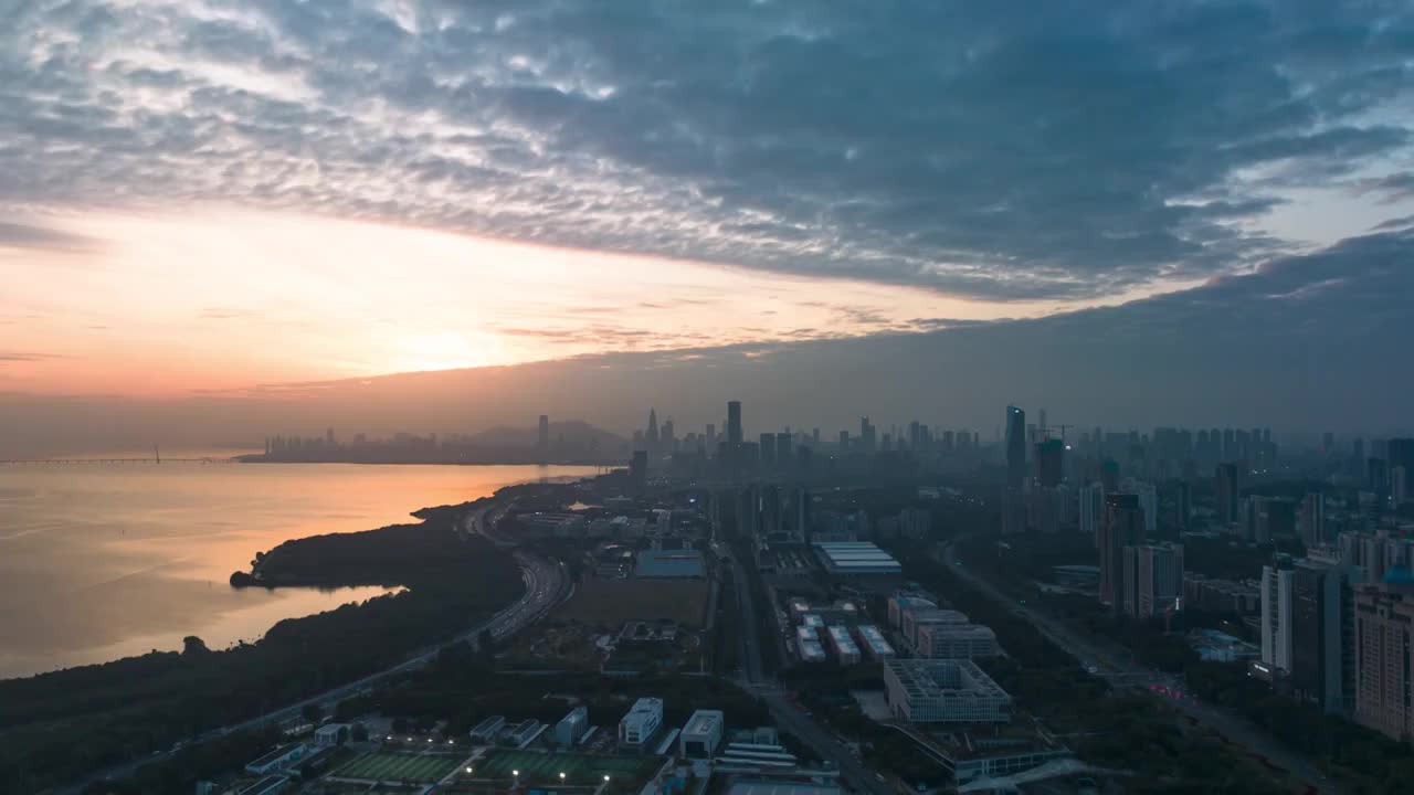 深圳深圳湾滨海大道夜景晚霞车流航拍延时视频素材