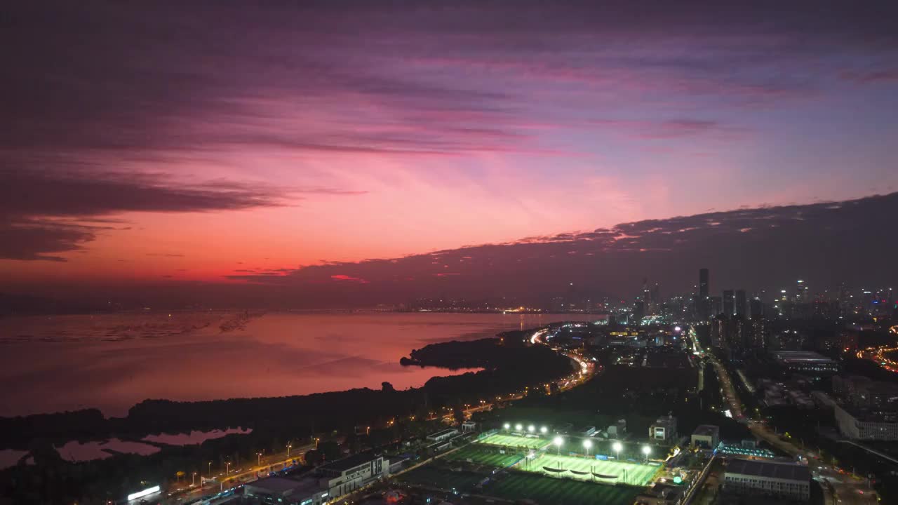 深圳深圳湾滨海大道夜景晚霞车流航拍延时视频素材