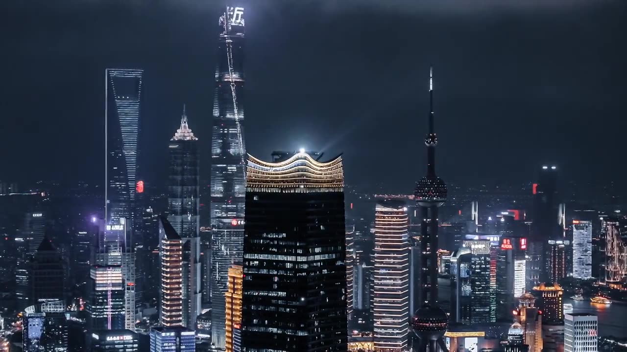 航拍上海白玉兰广场和陆家嘴夜景视频素材