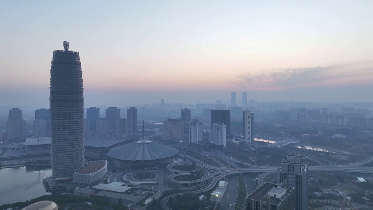 航拍河南郑州大玉米千禧广场日出风光视频素材