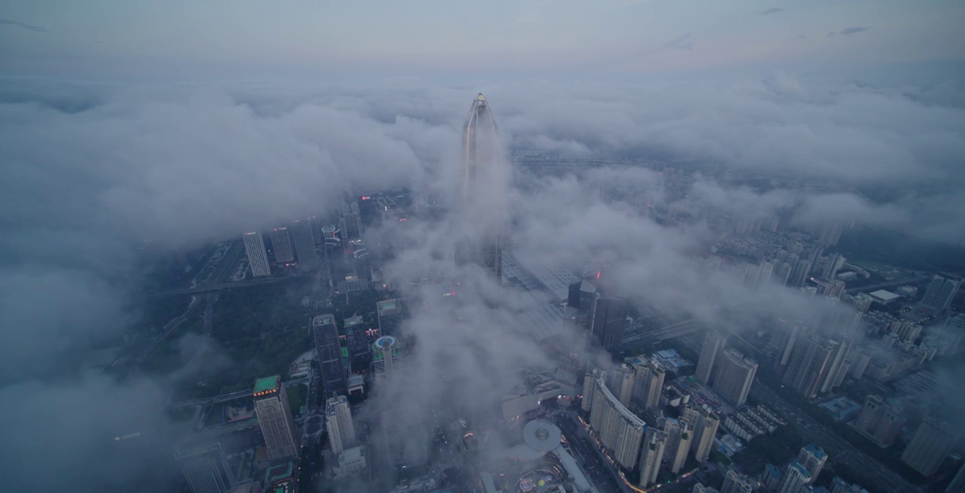 从云层上空看向深圳城市大景视频素材