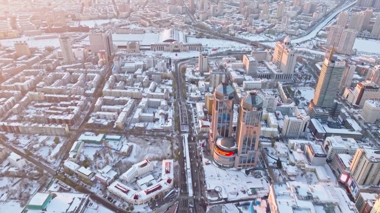 中国黑龙江哈尔滨城市雪景风光航拍视频素材