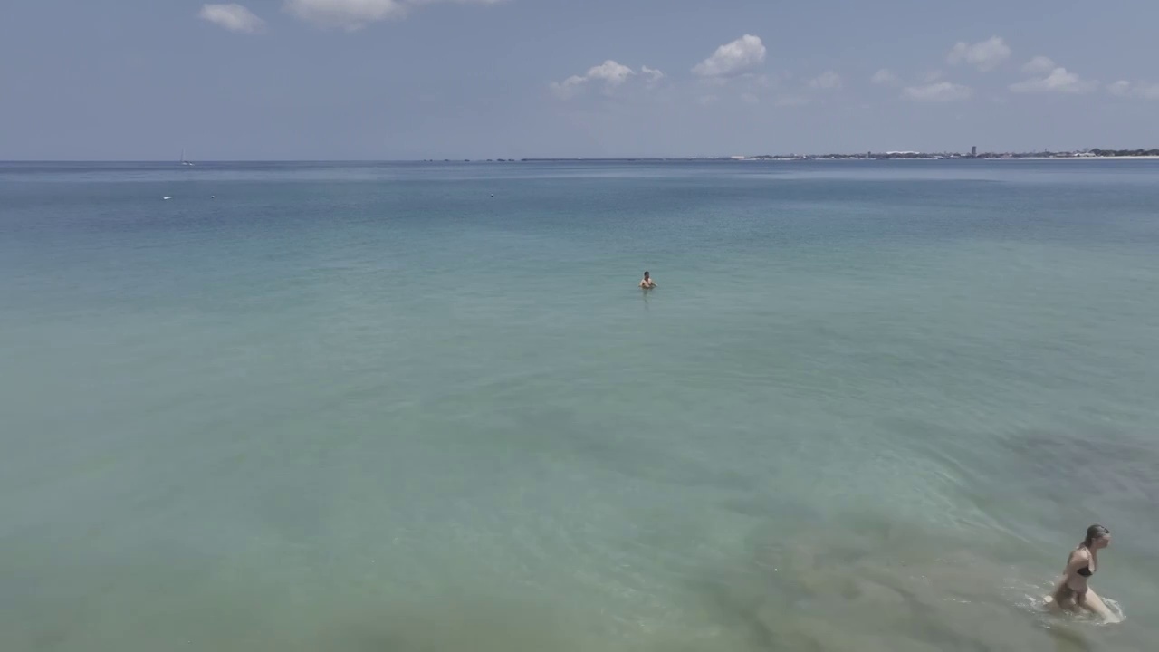 印尼巴厘岛金巴兰海滩自然风光航拍视频素材