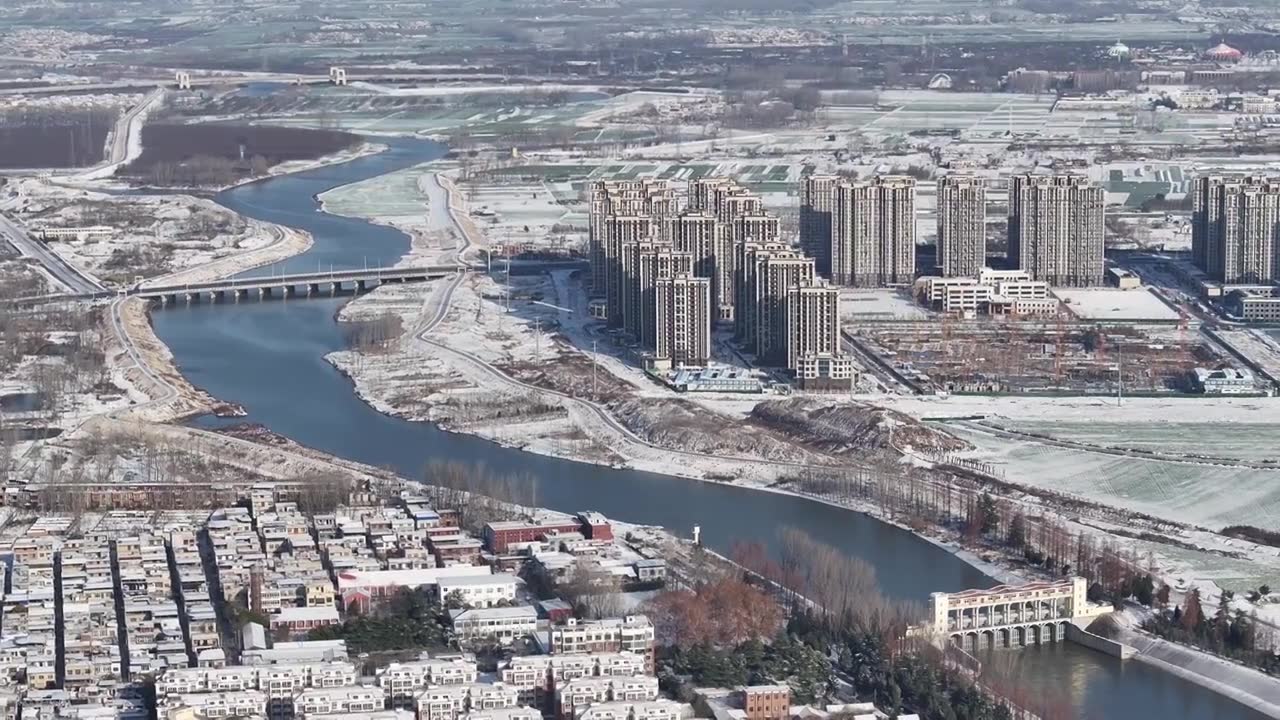 周口贾鲁河城市天际线雪景视频素材