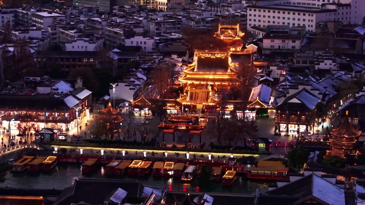 航拍南京夫子庙冬季雪景日落夜景 商业街大成殿龙照壁游船视频素材