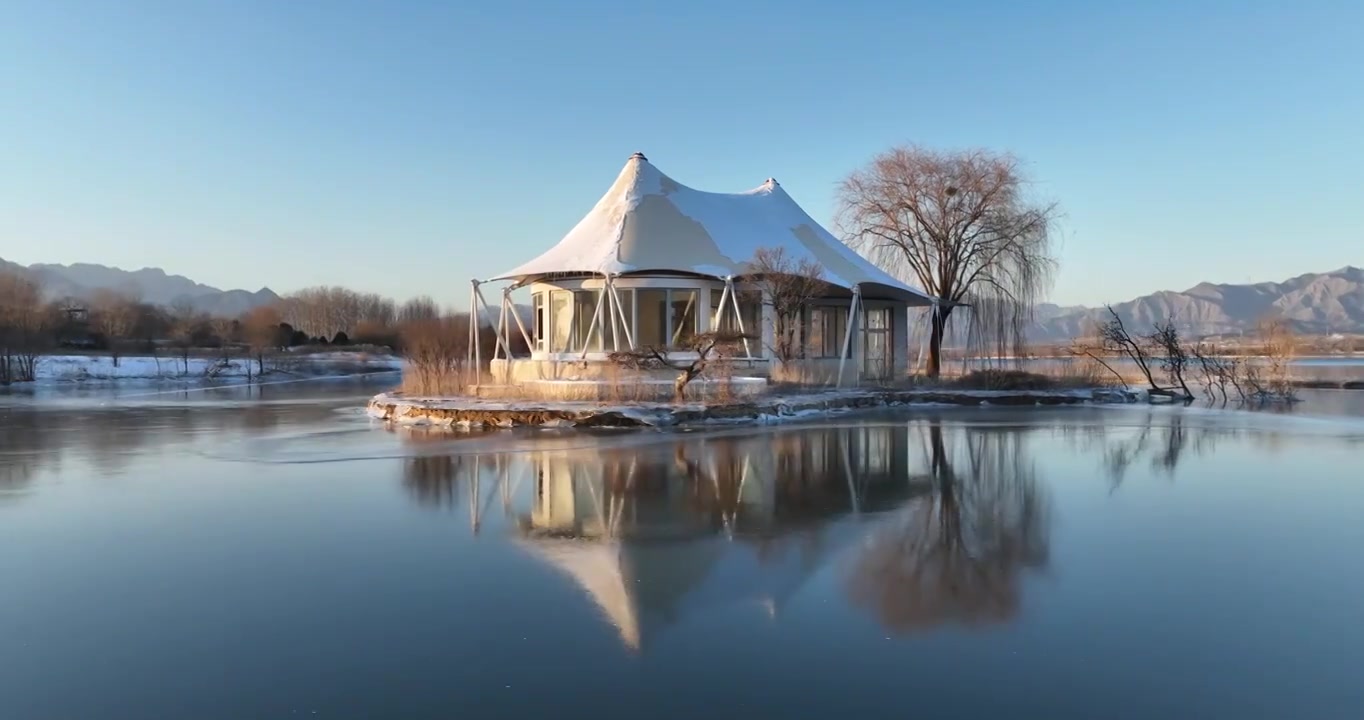 北京昌平区十三陵水库野营冬天雪景航拍视频素材