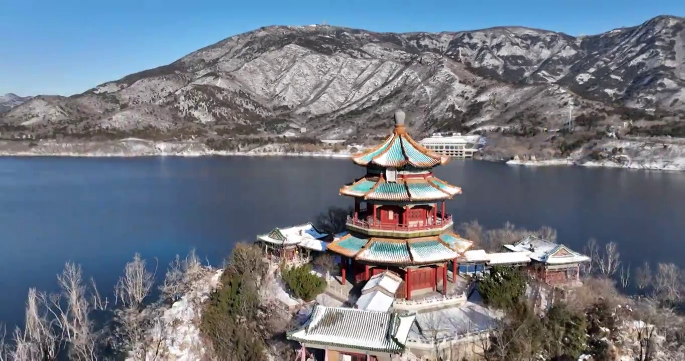 北京昌平区十三陵水库九龙宫冬天雪景航拍视频素材