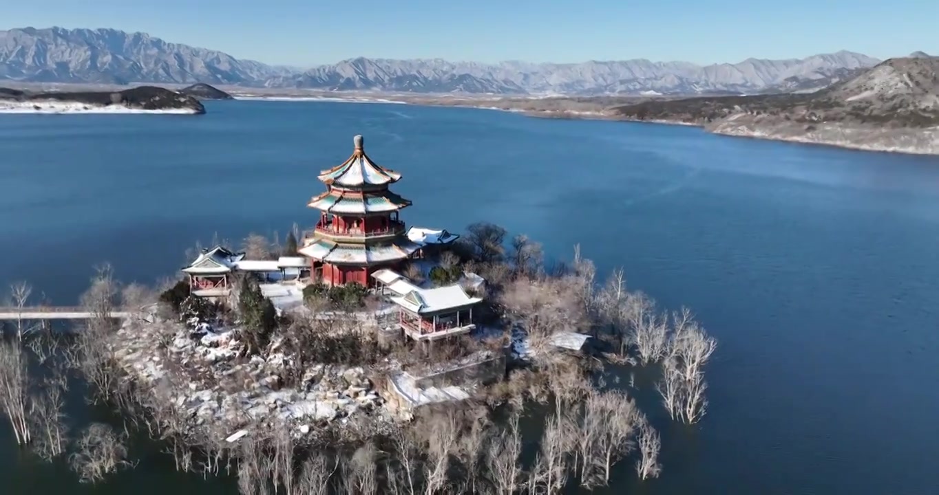 北京昌平区十三陵水库九龙宫冬天雪景航拍视频素材