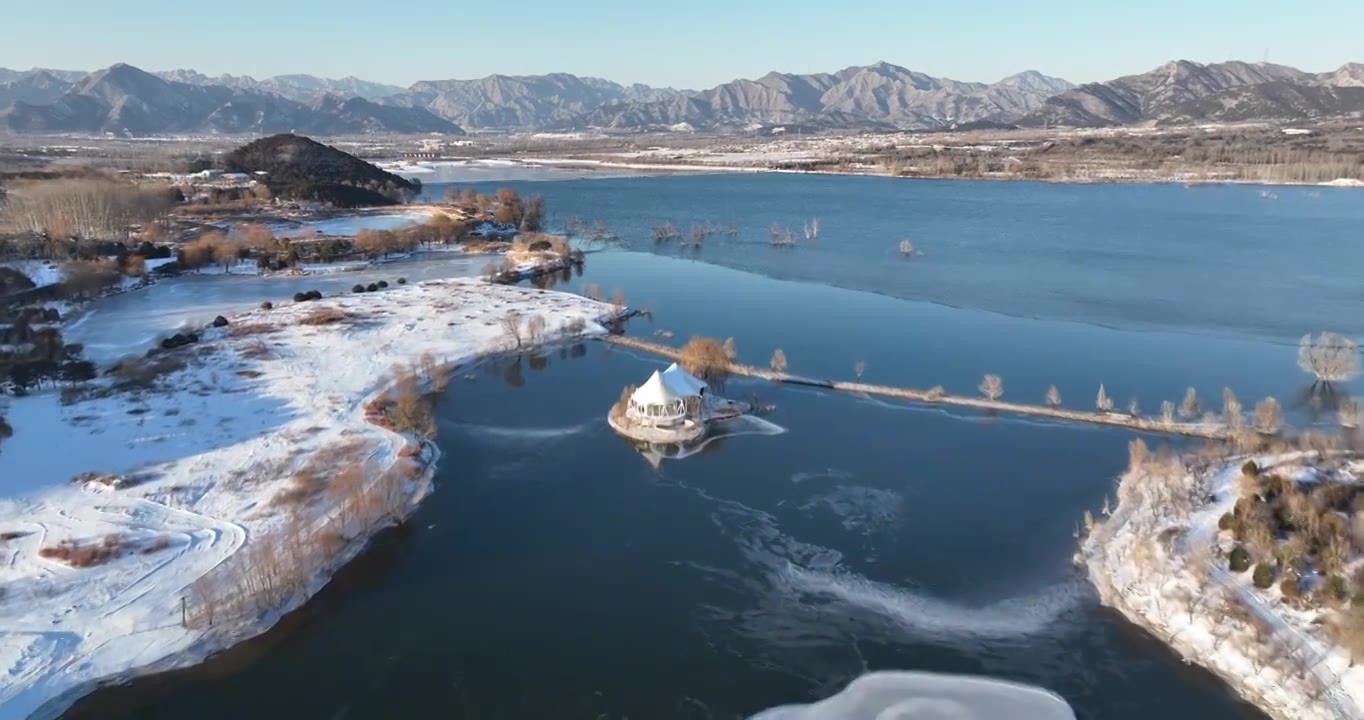 北京昌平区十三陵水库野营冬天雪景航拍视频素材