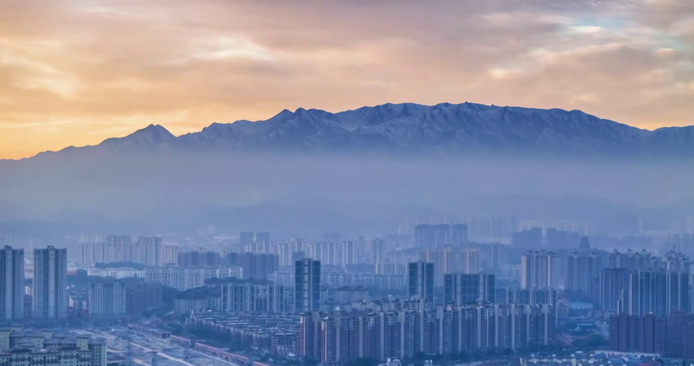 清晨庐山雪景下的九江城景航拍延时视频素材