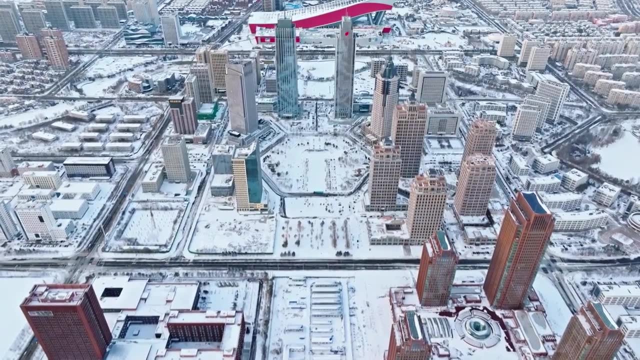 中国黑龙江哈尔滨松北新区雪景航拍视频素材