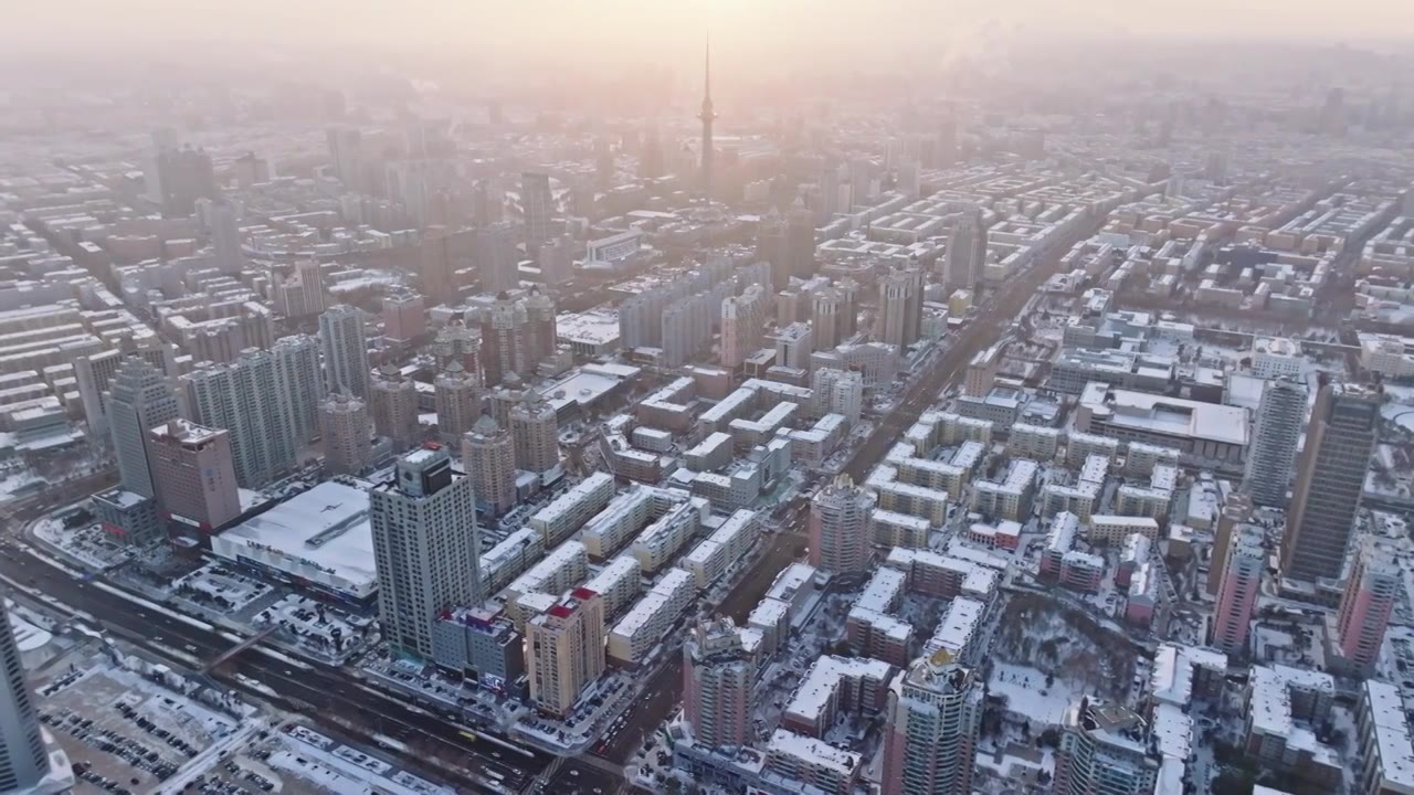 中国黑龙江哈尔滨龙塔城市雪景风光航拍视频素材