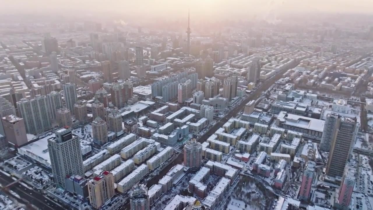 中国黑龙江哈尔滨龙塔城市雪景风光航拍视频素材