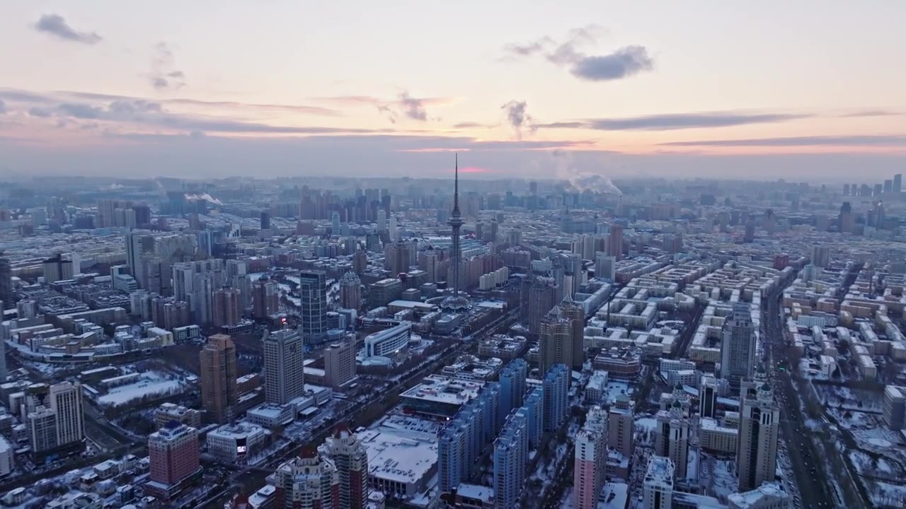 中国黑龙江哈尔滨龙塔城市雪景风光航拍视频素材