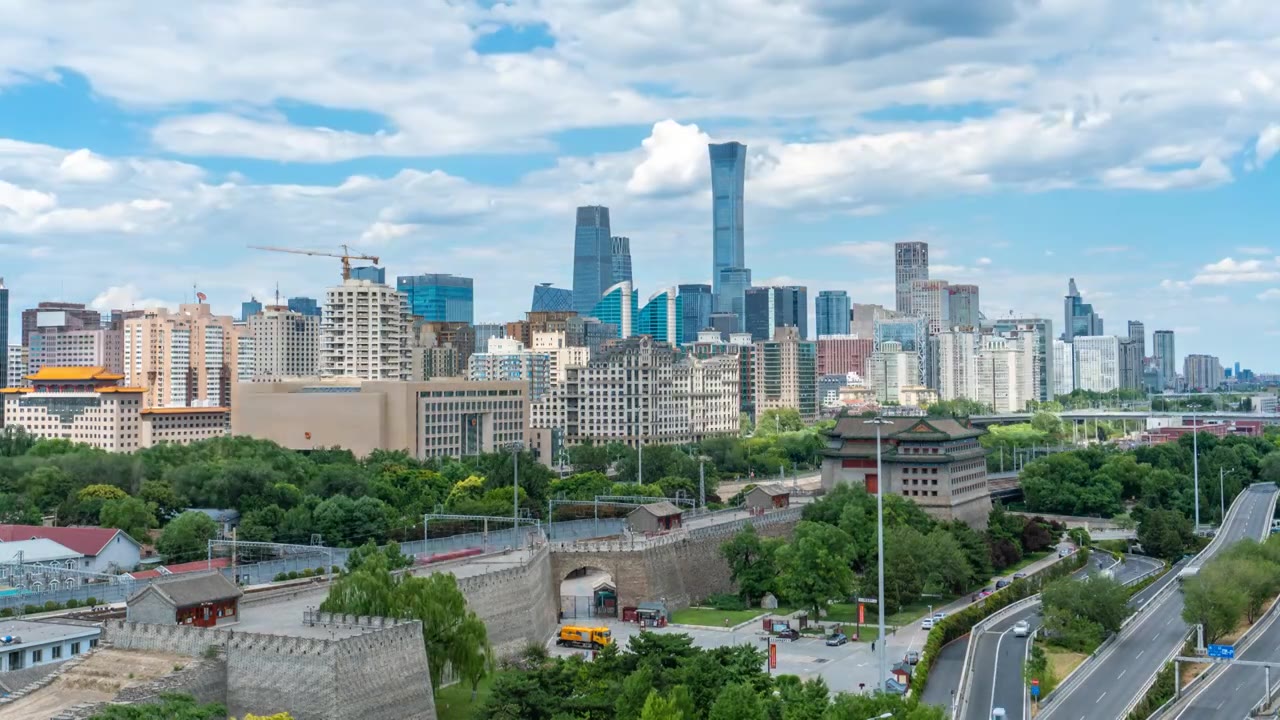 蓝天白云下的北京国贸CBD中国尊和古老的城墙箭楼城市天际线延时风光视频素材