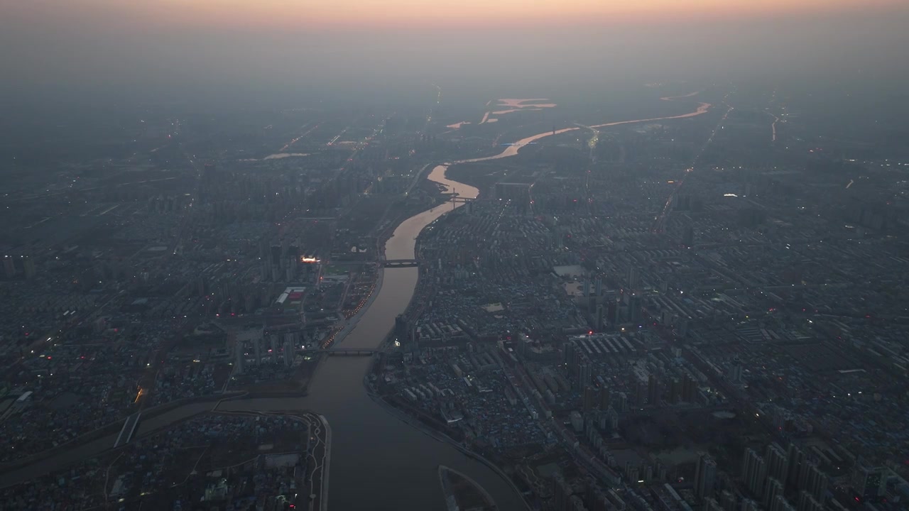 千米高空俯瞰周口城市天际线新年日出场景视频素材