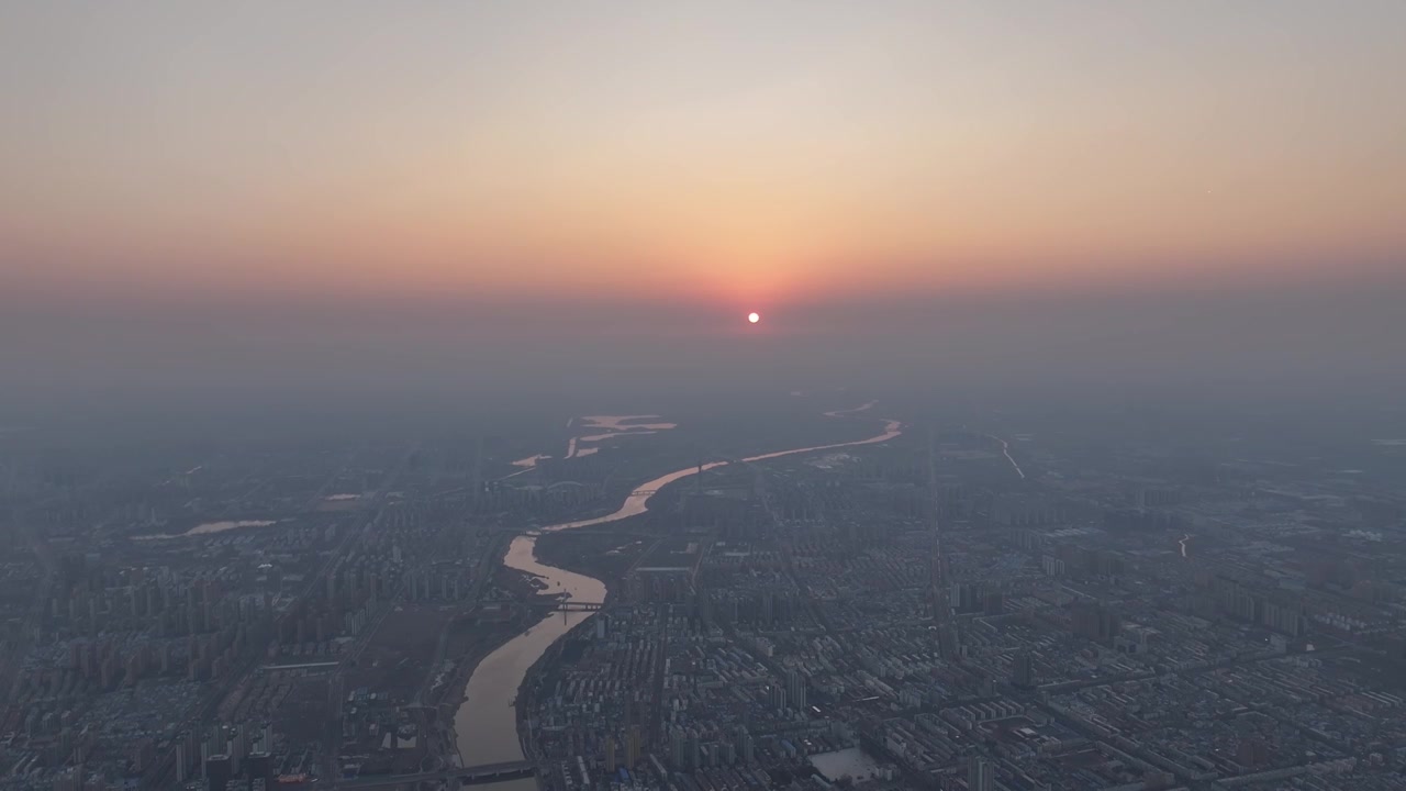 千米高空俯瞰周口城市天际线新年日出场景视频素材