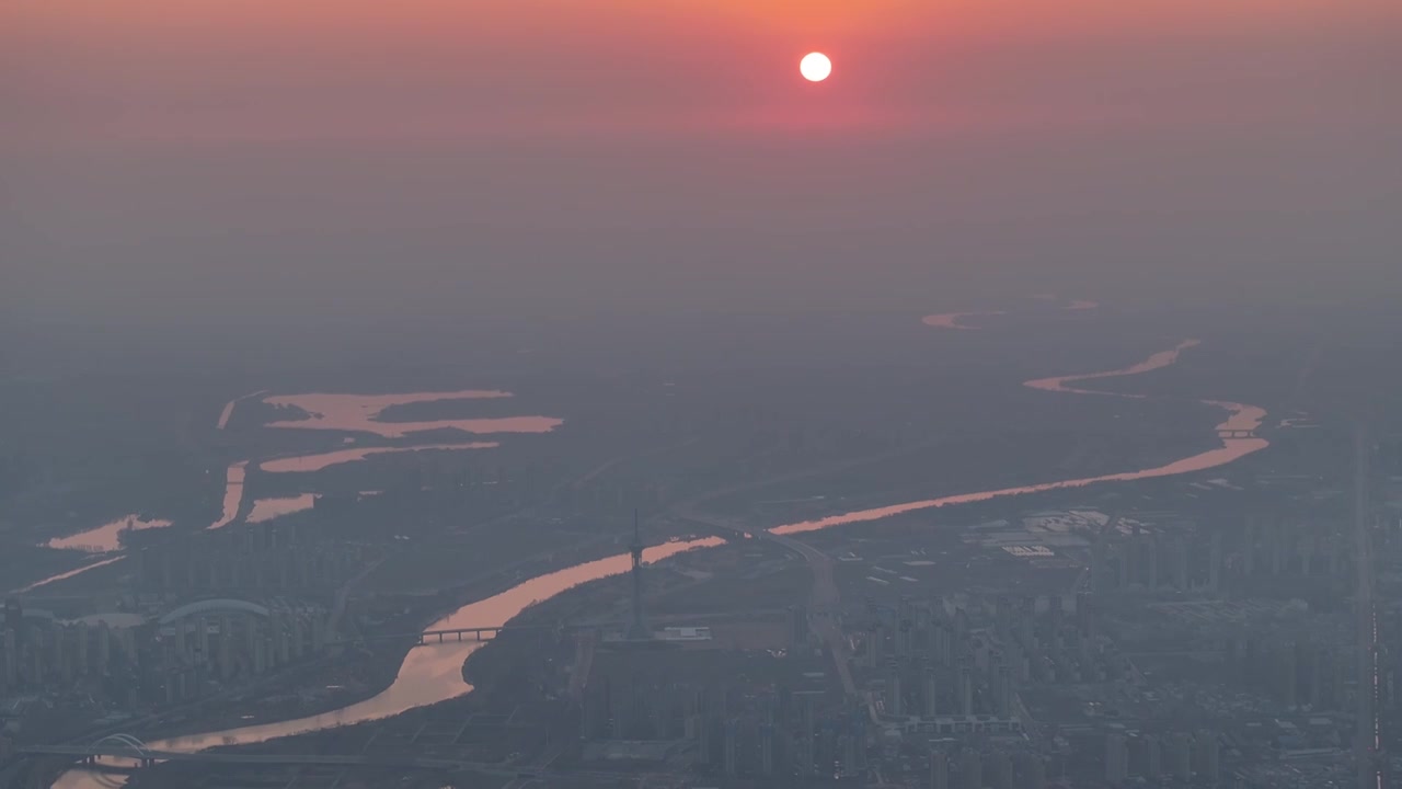 千米高空俯瞰周口城市天际线新年日出场景视频素材