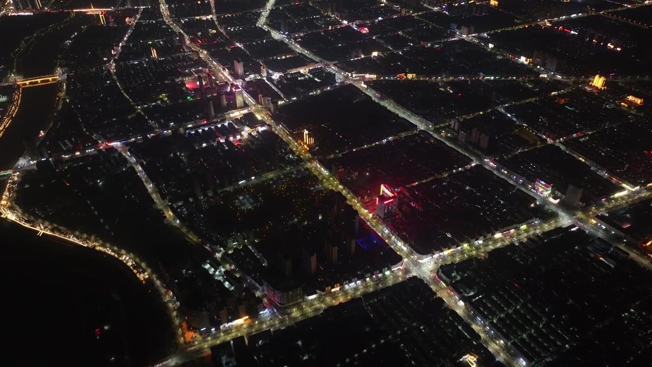 千米高空俯拍周口城市天际线新年夜景视频素材