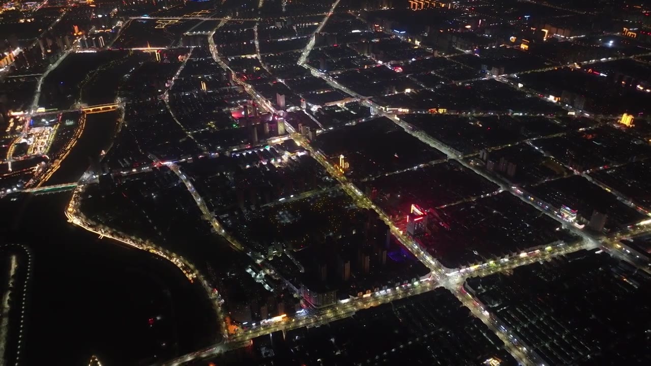 千米高空俯拍周口城市天际线新年夜景视频素材