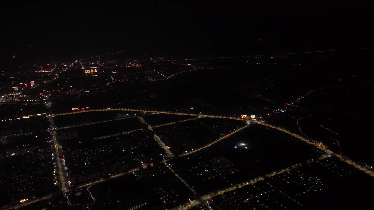 千米高空俯拍周口城市天际线新年夜景视频素材