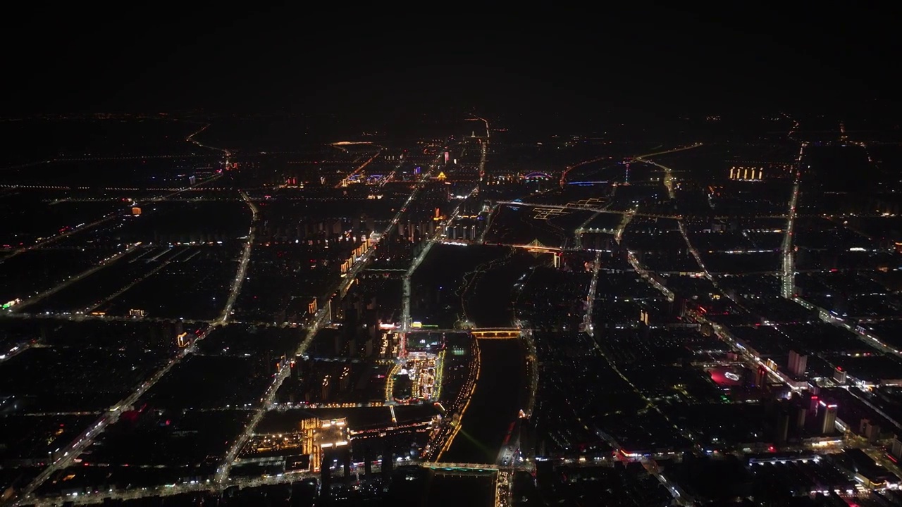 千米高空俯拍周口城市天际线新年夜景视频素材