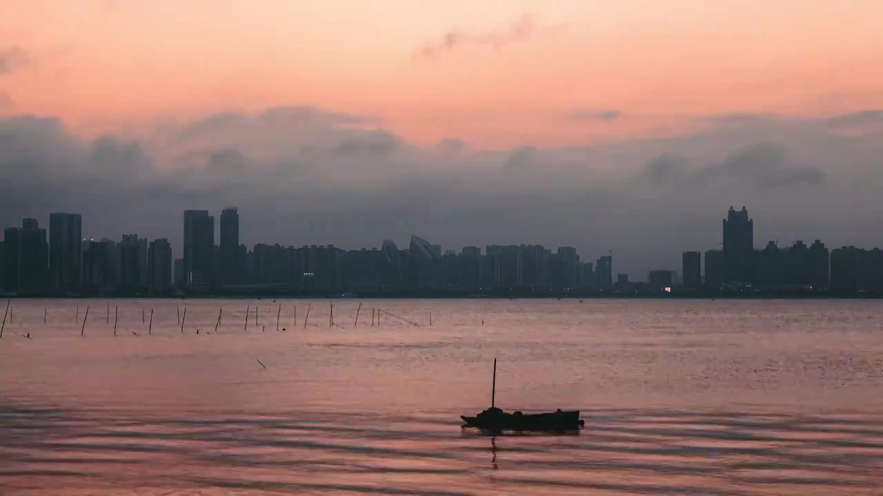 湛江城市晚霞日转夜延时视频下载