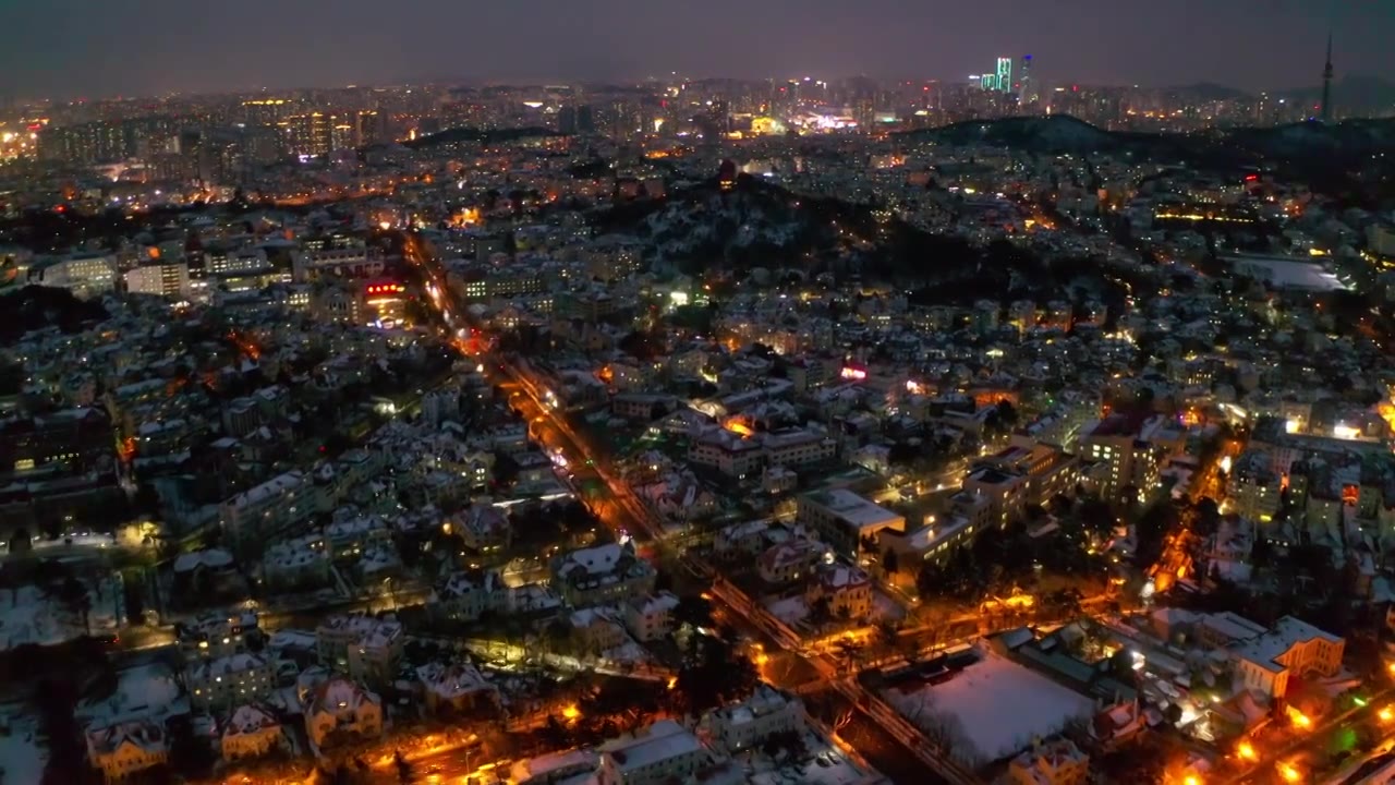 青岛雪后城市夜景航拍视频素材