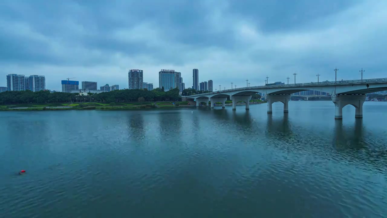 广西南宁邕江大桥多云天空城市风光延时视频素材