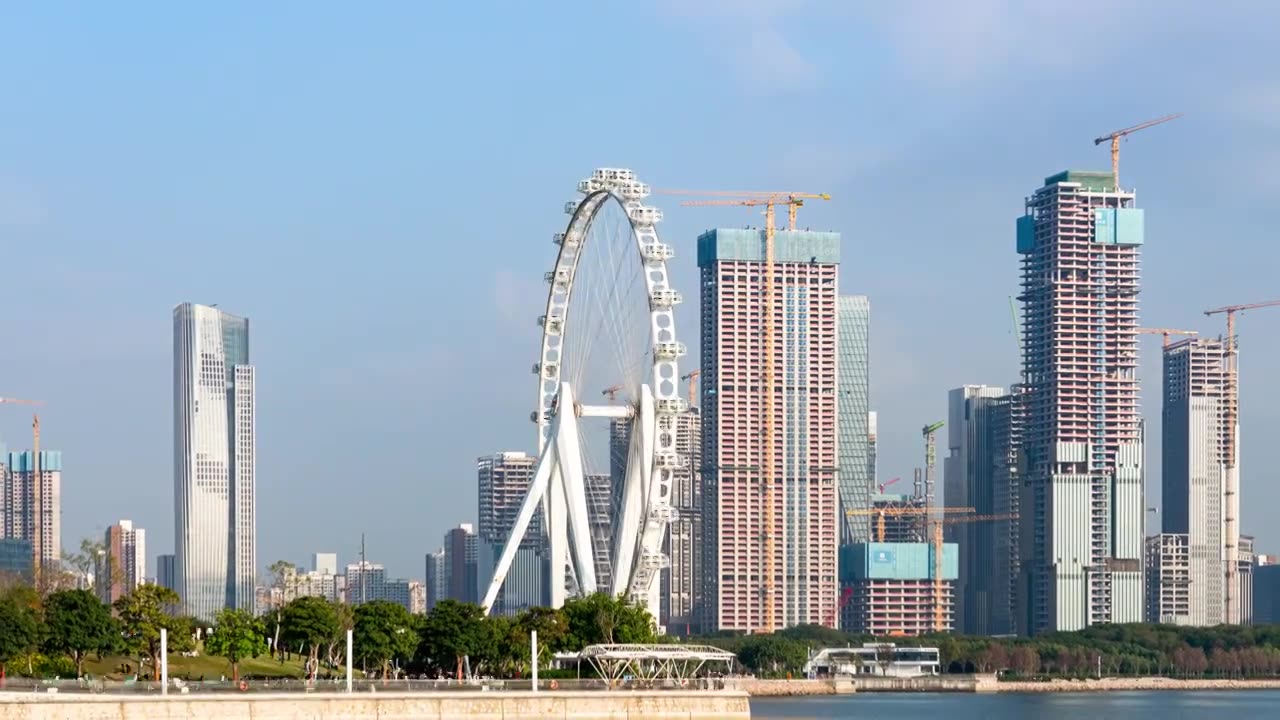 中国深圳前海CBD建筑群和湾区之光摩天轮延时摄影视频素材