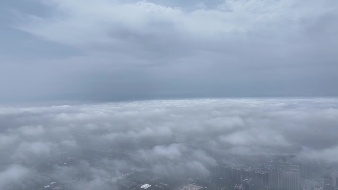 高视角有光云海，周口城市上空云景，大场景视频素材