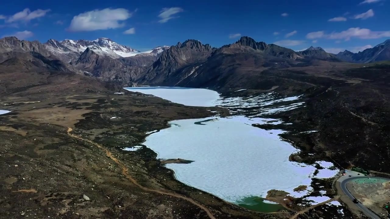 航拍理塘姐妹湖雪山冰湖视频素材