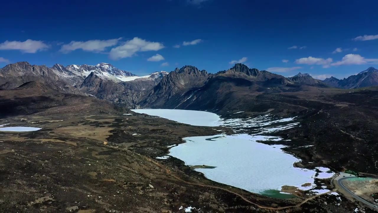 航拍理塘姐妹湖雪山冰湖视频素材