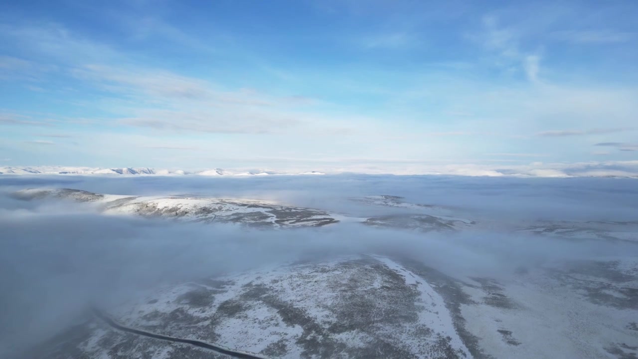 四川甘孜川西高原雪天山顶平流雾航拍合集视频素材