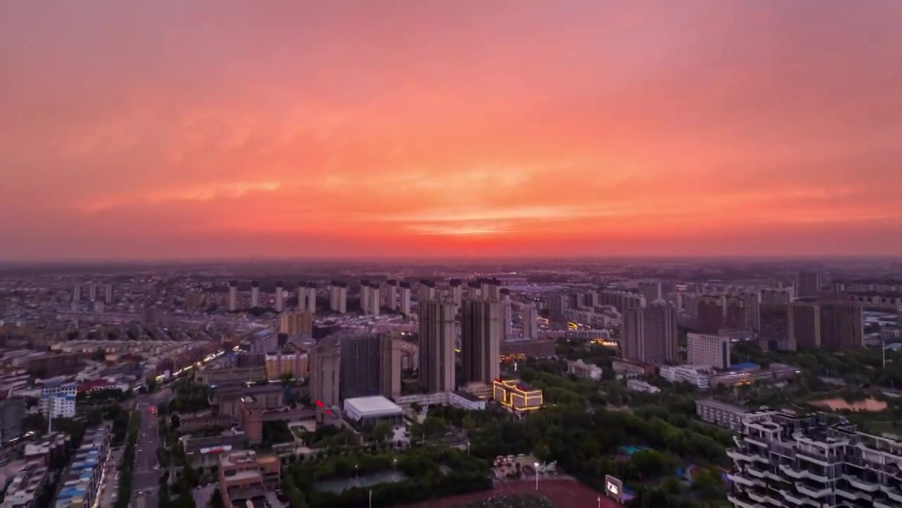 城市晚霞航拍延时视频素材