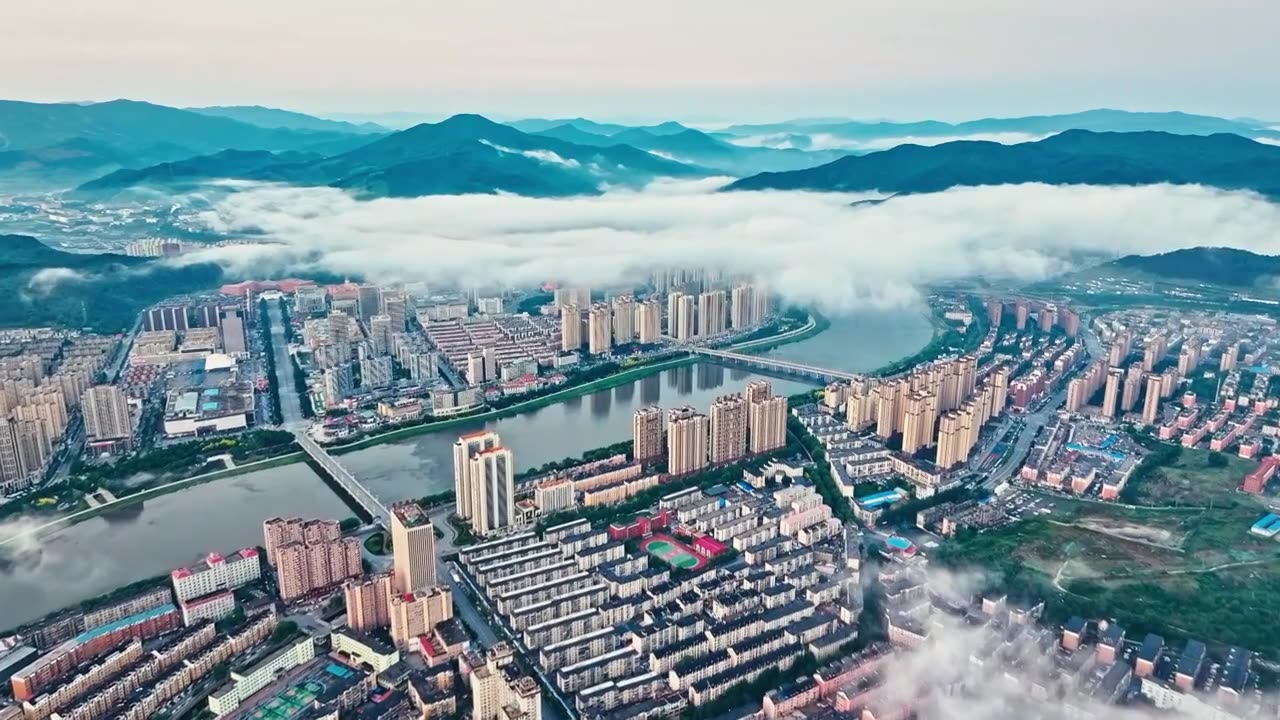 中国吉林省通化市浑江城市日出云海视频素材