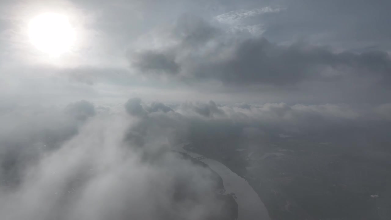 高视角云层之上航拍周口沙颍河流域城市天际线视频素材