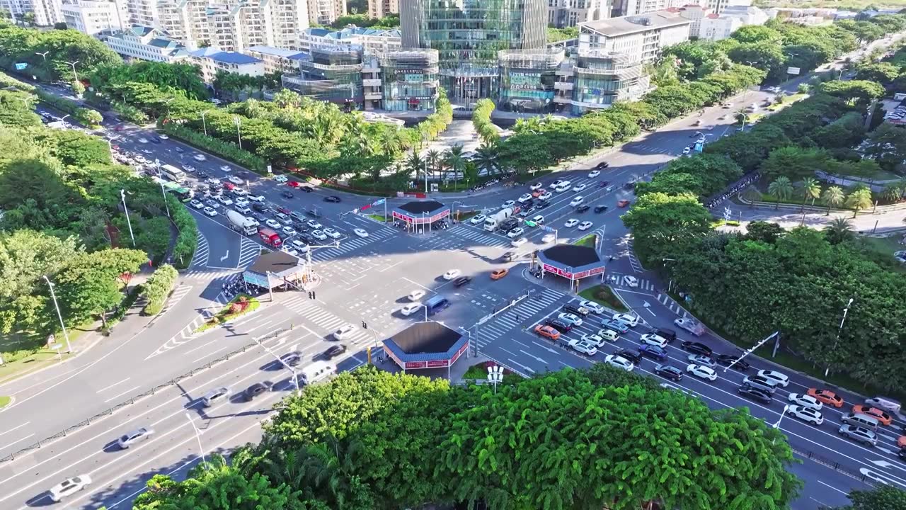 航拍城市道路十字路口车来车往视频素材