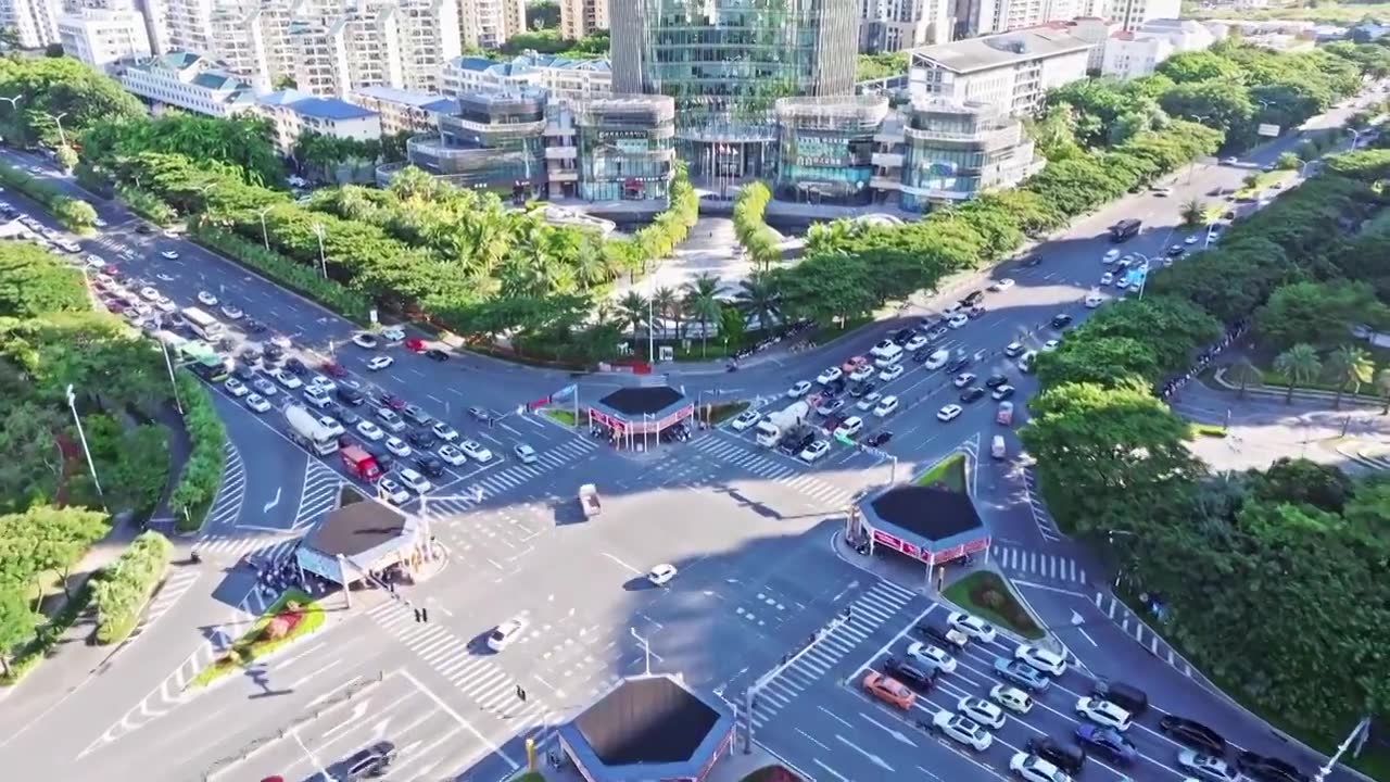 航拍城市道路十字路口车来车往视频素材