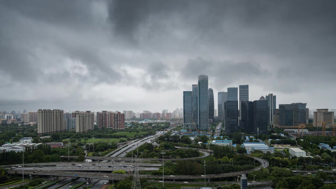 北京雨中的丽泽商务区8K延时视频素材