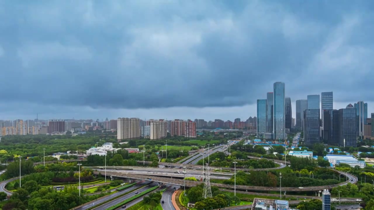 北京雨中的丽泽商务区8K延时视频素材