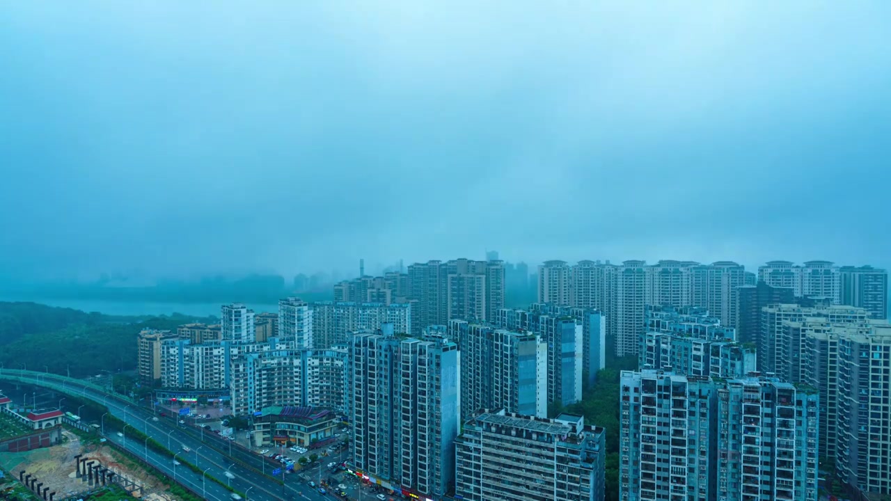 南宁柳沙与五象新区城市高楼建筑与雨雾天气视频素材