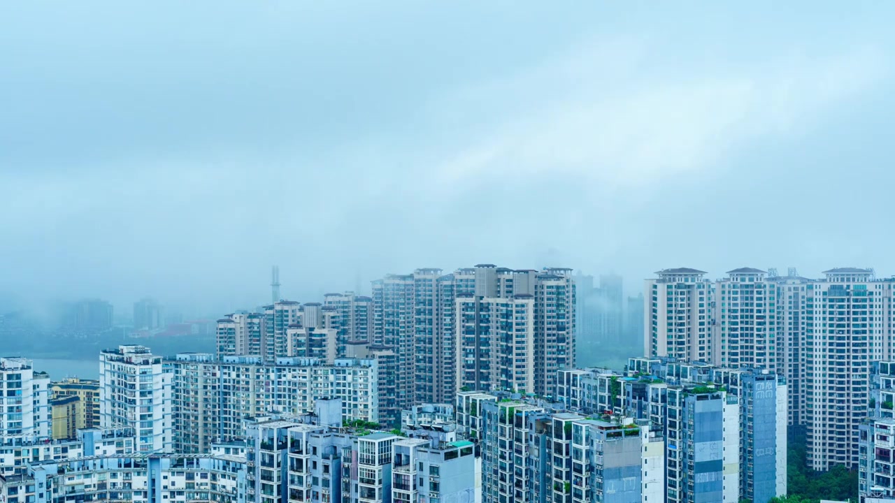 南宁柳沙与五象新区城市高楼建筑与雨雾天气视频素材