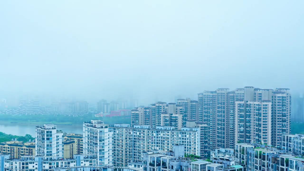 南宁柳沙与五象新区城市高楼建筑与雨雾天气视频素材