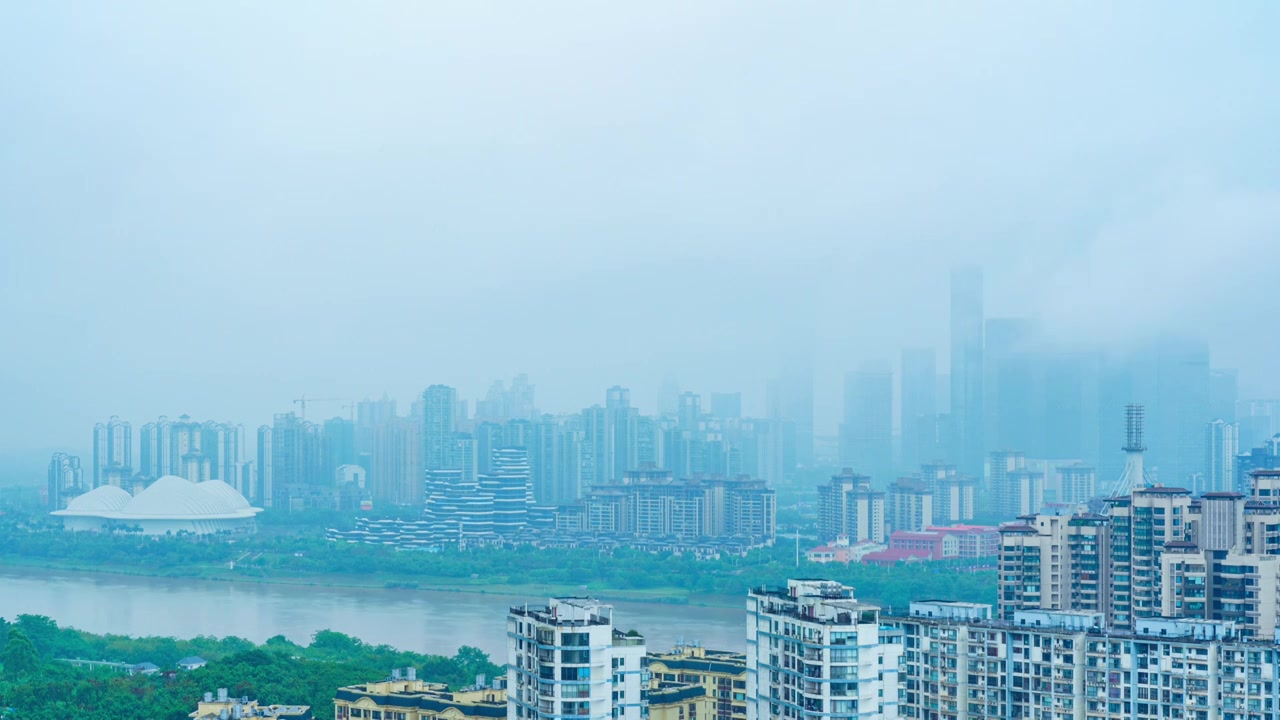 南宁五象新区城市高楼建筑与邕江雨雾缭绕视频素材