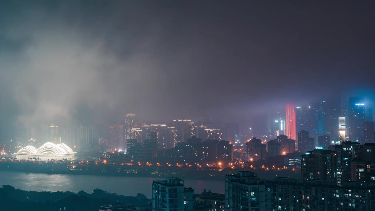 云雾缭绕的南宁五象新区摩天大楼夜景灯光视频素材